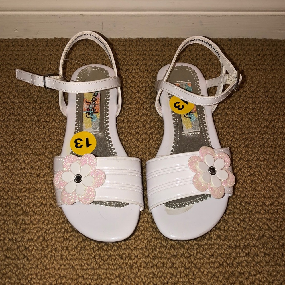White girls shoes with pink flower